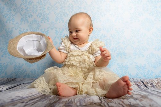 Portrait of adorable baby girl. Childhood. Authentic image