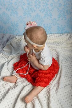 Portrait of adorable baby girl. Childhood. Authentic image