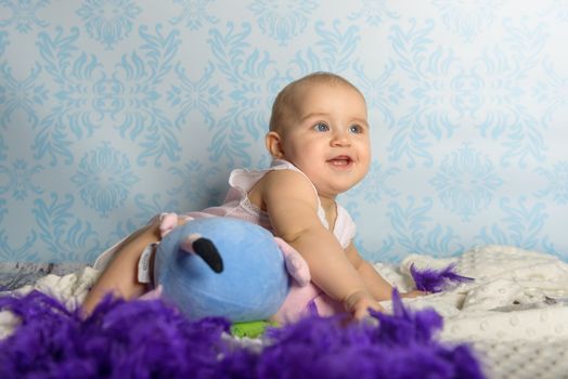 Portrait of adorable baby girl. Childhood. Authentic image