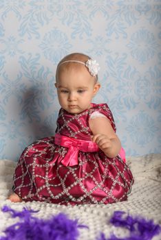 Portrait of adorable baby girl. Childhood. Authentic image