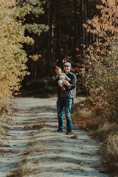 Happy loving family. Father and his daughter child girl playing and hugging outdoors. Authentic lifestyle. Concept of Father's day.