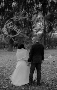 Bride and groom at a photo session in the nature.