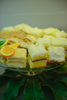 Delicious sweets on candy buffet. Wedding bakes on trays.