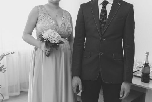 Bride and groom at church wedding during ceremony. Beautiful decoration