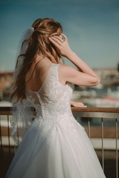 Bride and groom at a photo session in the marina area