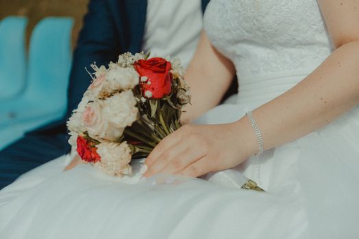 bouquet in the hands of the bride.