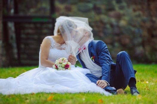 Bride and groom at a photo session in the nature.