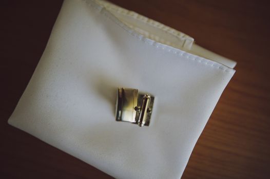 Groom's wedding accessories. Bow tie, suit, cufflinks, belt and shoes