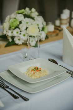 The elegant dinner table. Wedding table setting