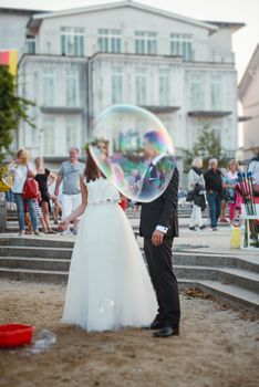 Bride and groom at a photo session in the nature.