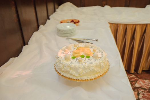 Delicious Wedding Cake at the party. Smoke and fire effects