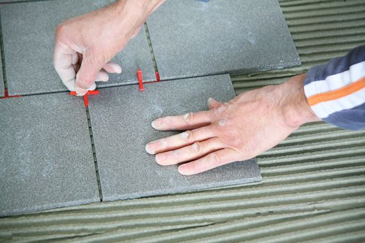 a tiler worker at work