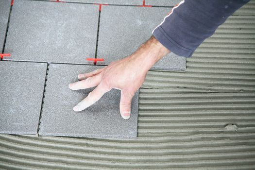 a tiler worker at work