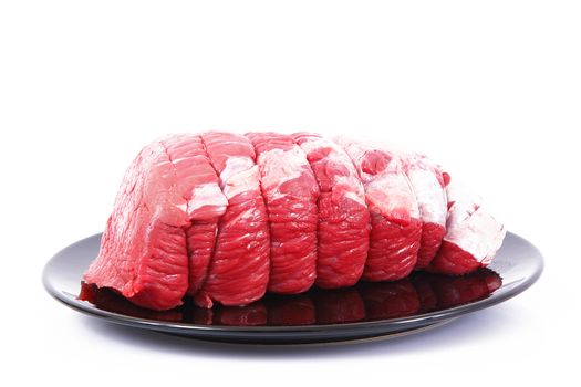 Raw beef meat for roast on white background