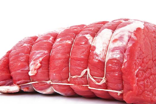 Raw beef meat for roast on white background
