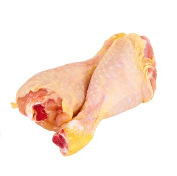 Fresh chicken thighs on white background