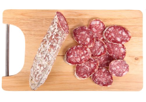 italian salami slices on chopping board background