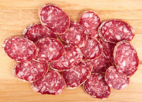 italian salami slice on chopping board background