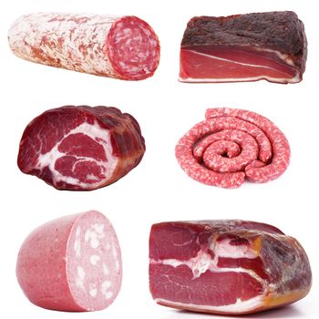 collection of italian salami and ham on white background