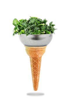 a Delicious ice cream cone with spinach taste