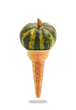 a Delicious ice cream cone flavored with pumpkin