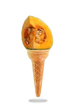 a Delicious ice cream cone flavored with pumpkin