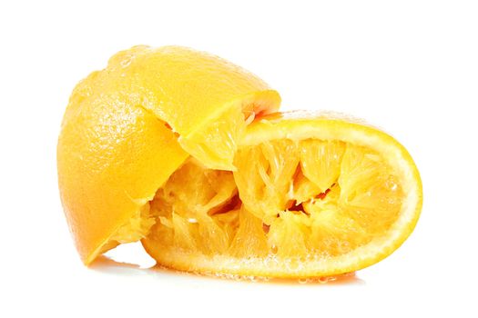 crushed orange on white background