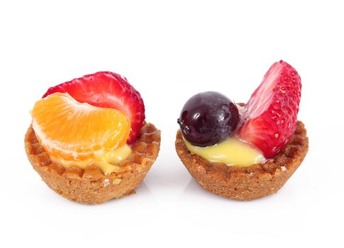 delicious fruit pastries on white background