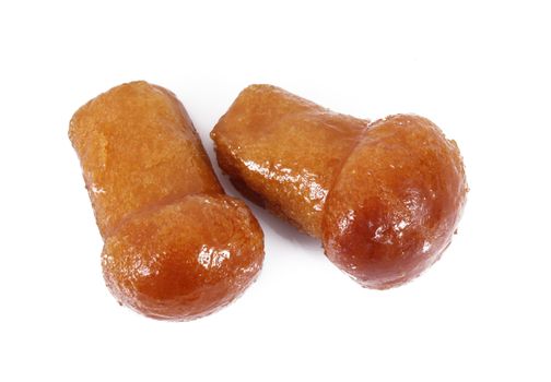 delicious rum pastries on white background
