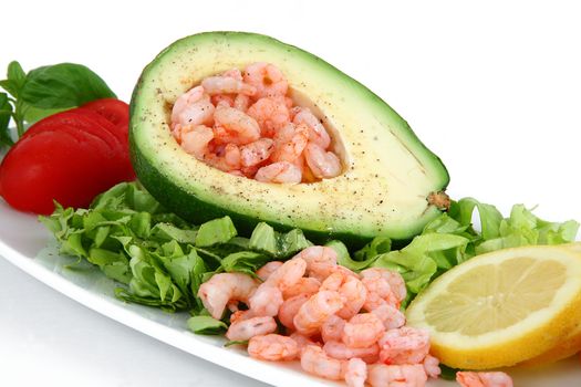 avocado with shrimps on white background