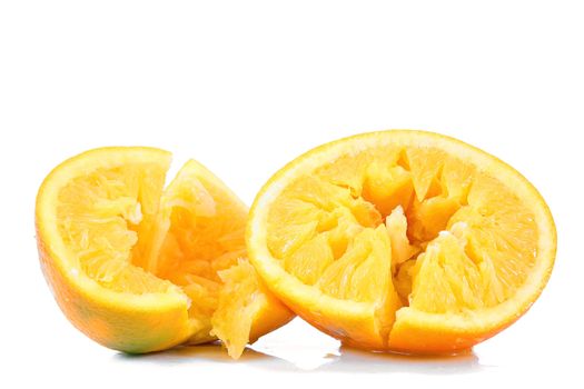 crushed orange on white background