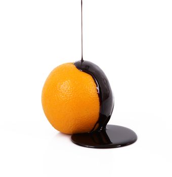 orange with chocolate on white background