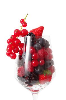 fresh fruit berries in glass on white background