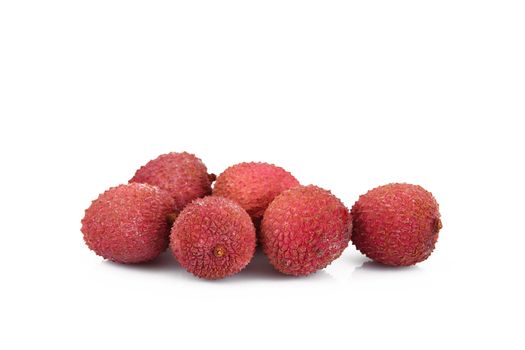 fresh lychees on white background