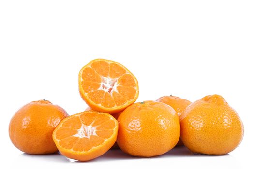fresh tangerines on white background