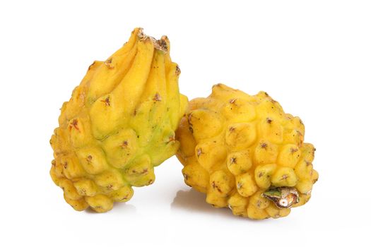 fresh yellow pitaya on white background
