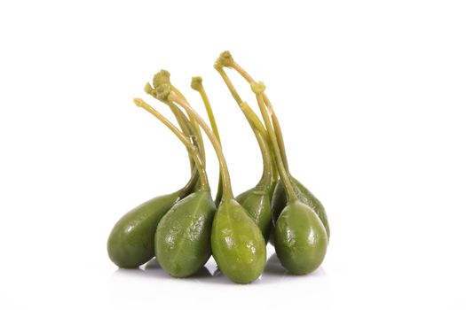 fresh capers on white background