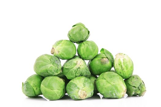 fresh brussels sprouts on white background