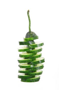 fresh cut cucumber on white background