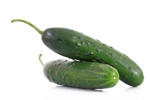 fresh cucumbers on white background