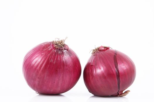fresh red onions on white background
