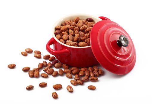 dry beans in pot on white background