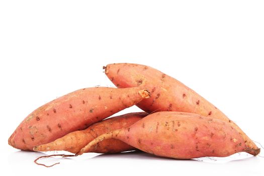a fresh sweet potatoes on white background