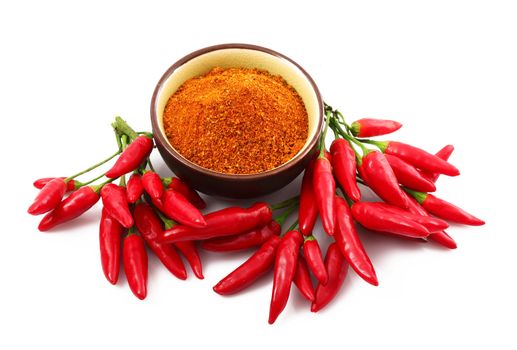 fresh hot peppers on white background