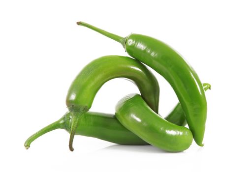 fresh hot peppers on white background