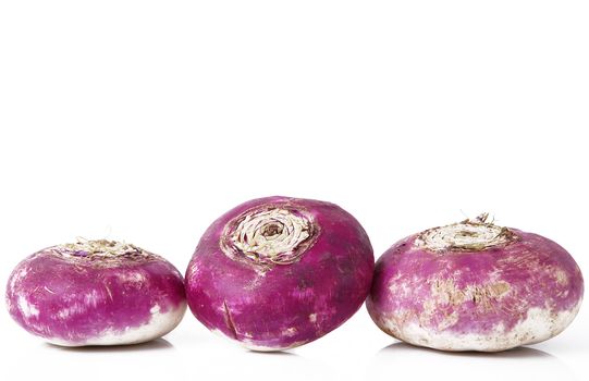 a fresh red turnip on white background