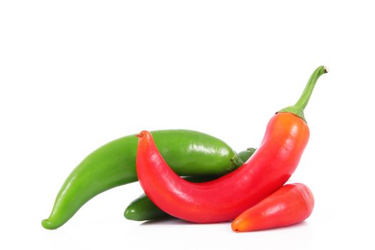 fresh hot peppers on white background