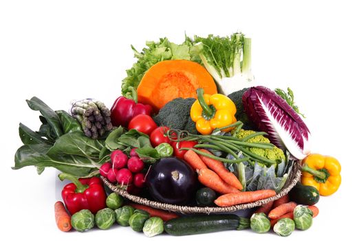 a fresh group of vegetables on white background
