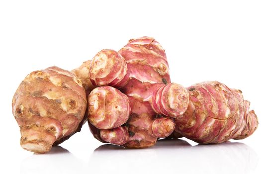 a fresh jerusalem artichoke on white background