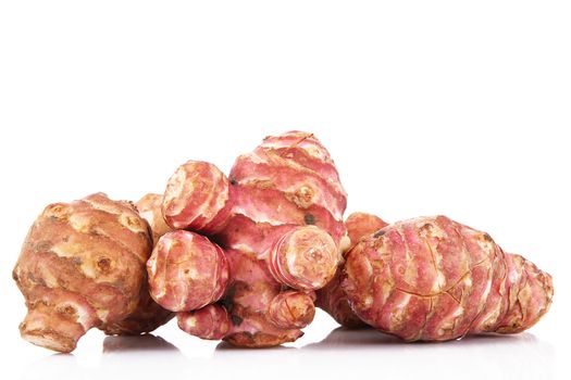 a fresh jerusalem artichoke on white background